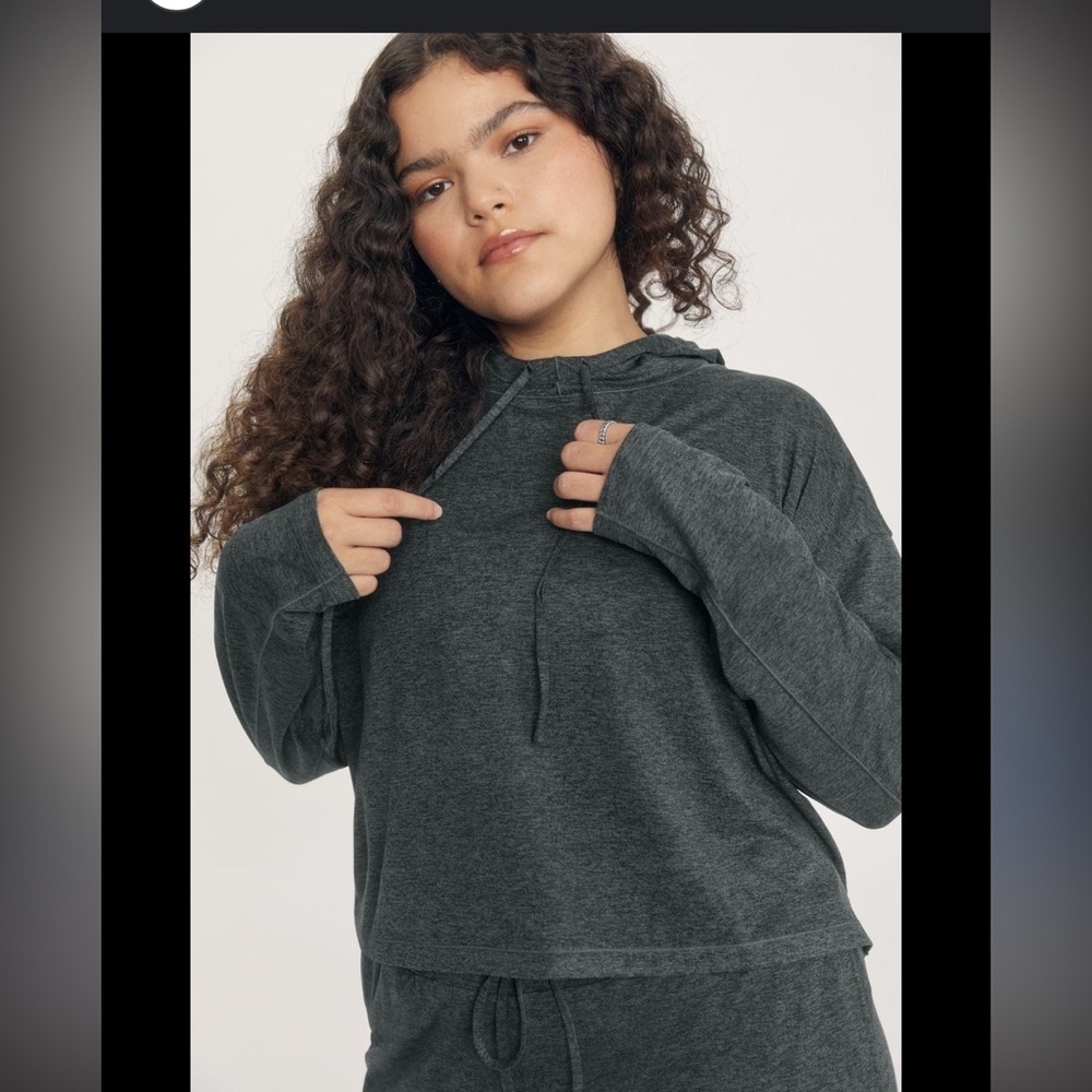 Revolve Girlfriend Collective ReSet Cropped Hoodie in a charcoal gray